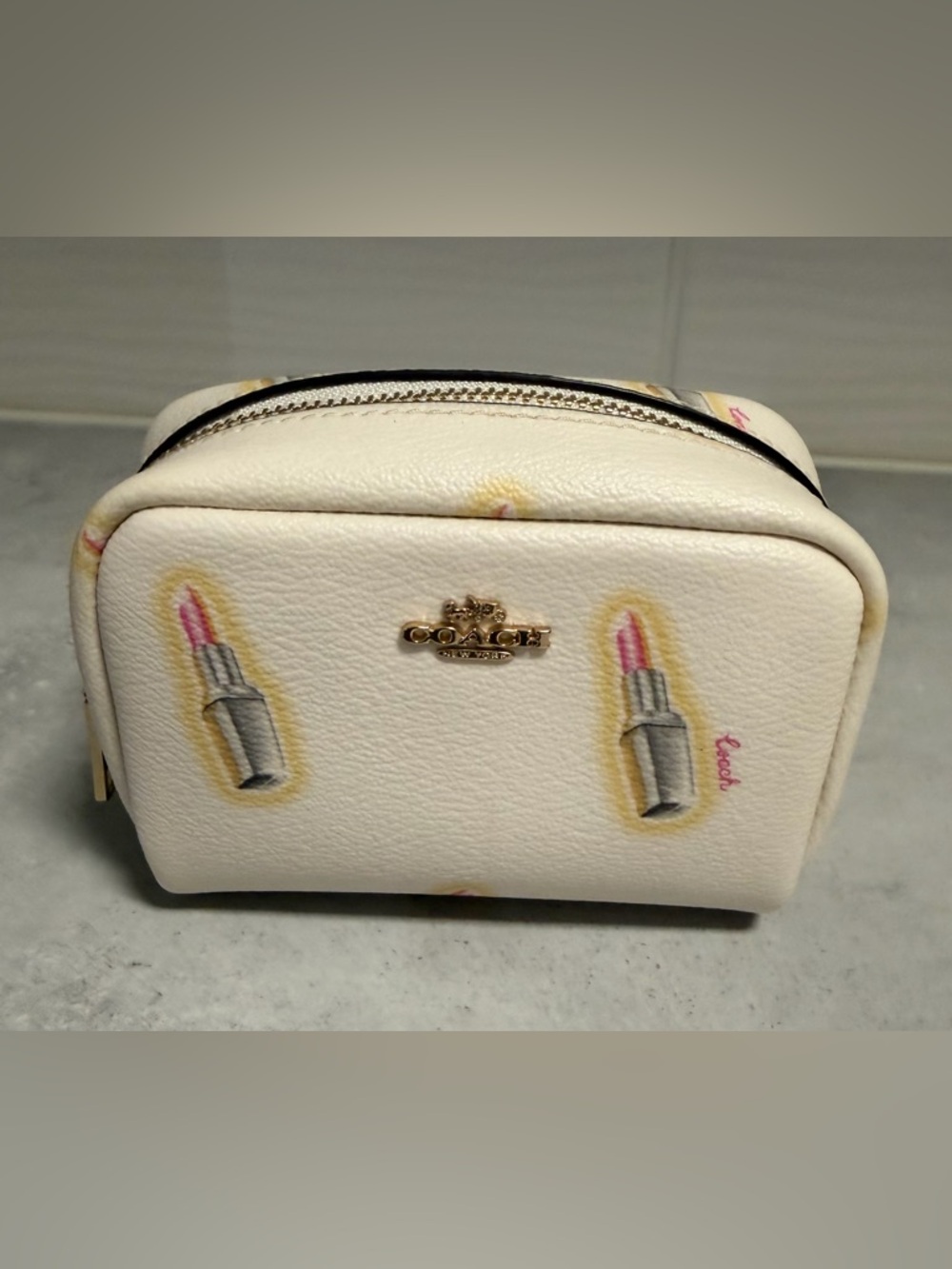 COACH Mini Boxy Cosmetic Pouch in Lipstick print on chalk colored canvas.
